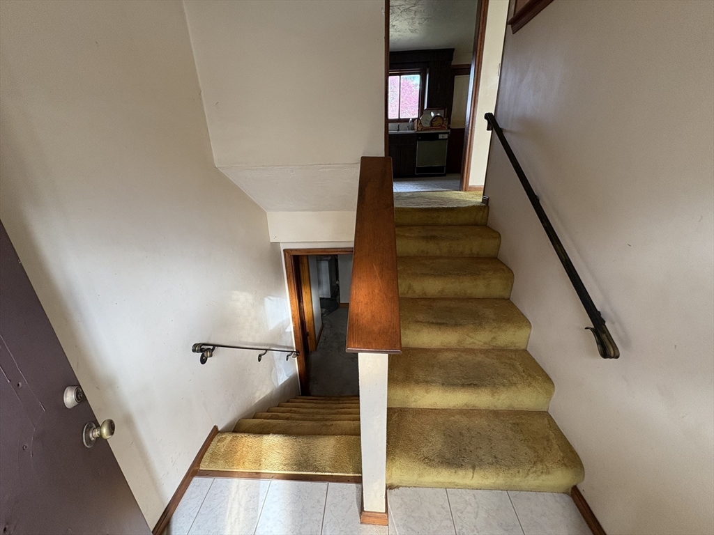 172 Russ Street Randolph, MA 02368 - Photo 5 of 15 a view of entryway and hall with wooden floor