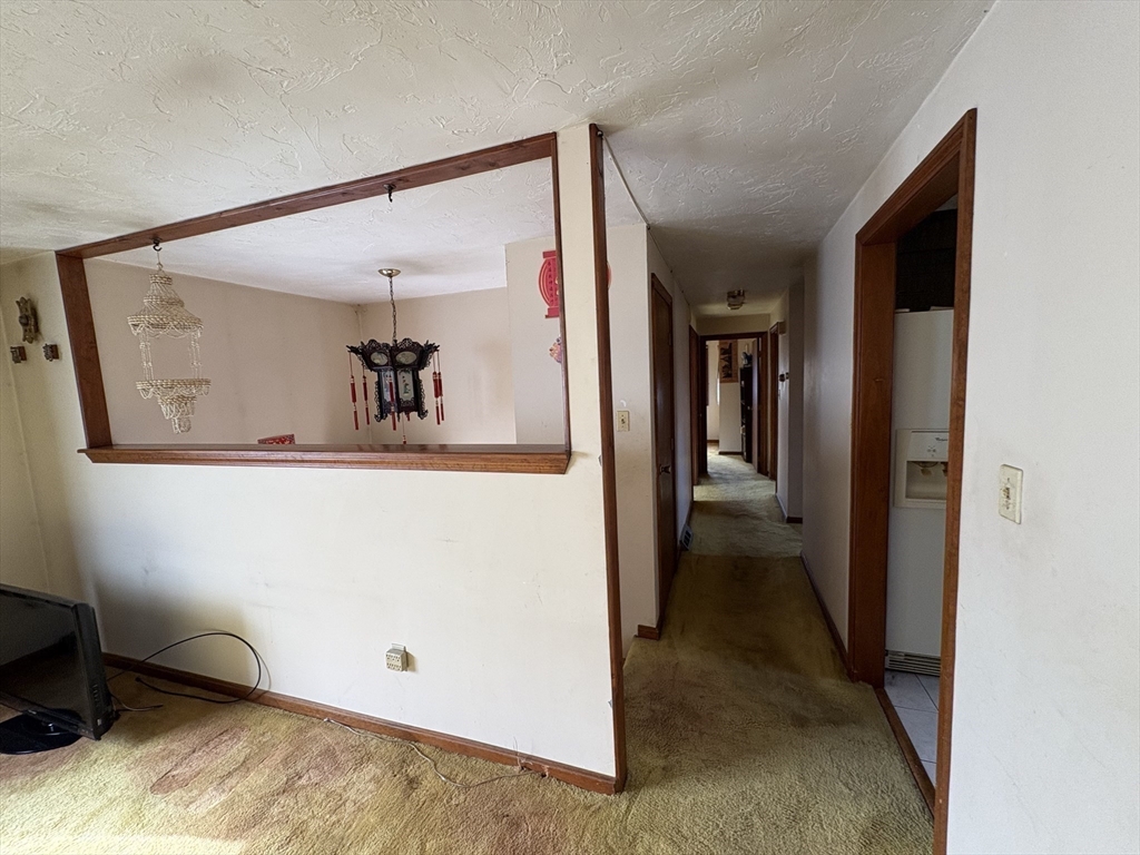 172 Russ Street Randolph, MA 02368 - Photo 7 of 15 a view of a hallway with workspace