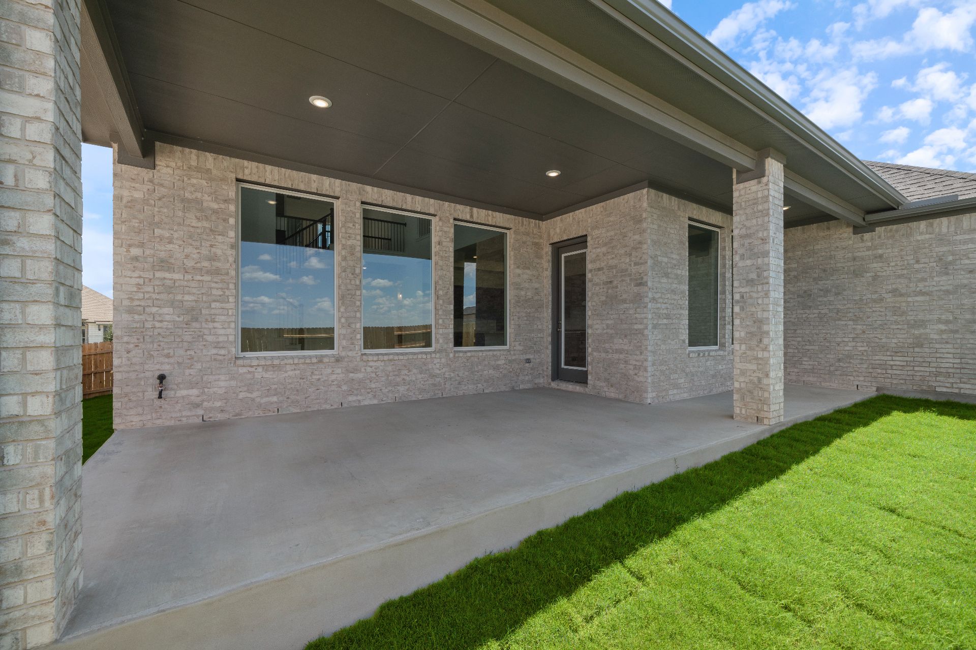 820 South Hemingway Loop Liberty Hill, TX 78642 - Photo 23 of 35 Rear Covered Patio