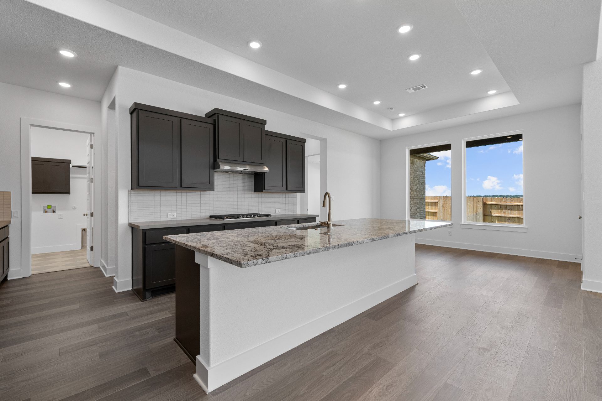 820 South Hemingway Loop Liberty Hill, TX 78642 - Photo 9 of 35 Large Center Island in Kitchen