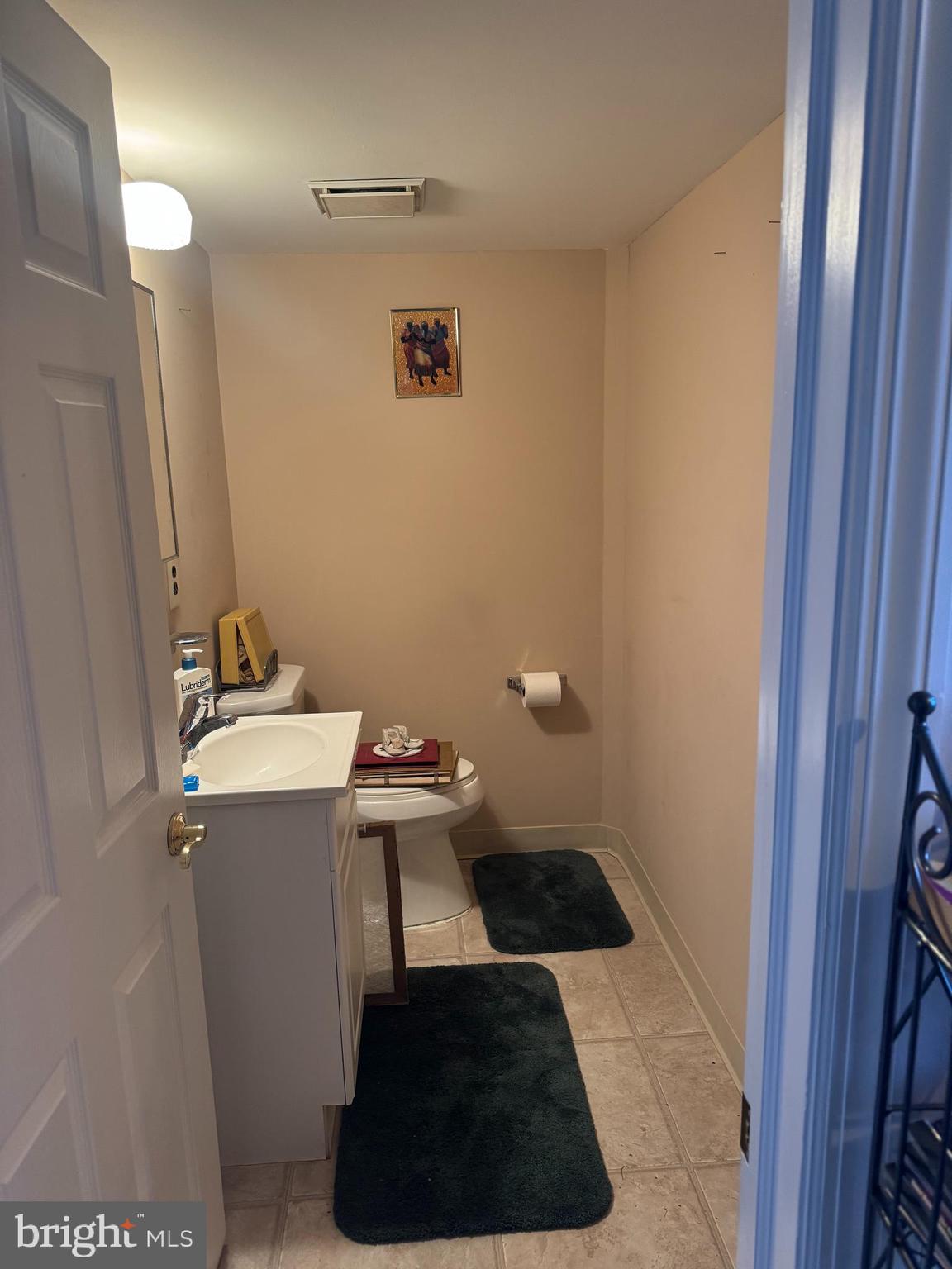 15 Estate Road Pemberton, NJ 08068 - Photo 7 of 23 a bathroom with a sink a toilet and a mirror