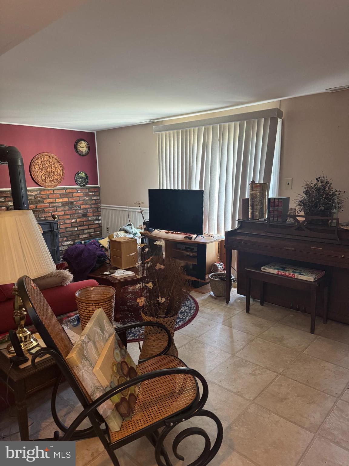 15 Estate Road Pemberton, NJ 08068 - Photo 9 of 23 a living room with furniture a flat screen tv and a window