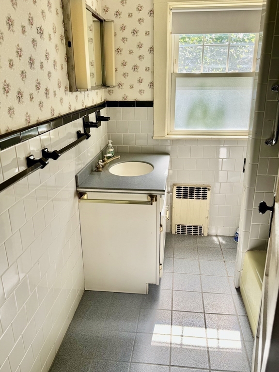 25 Hummock Road Quincy, MA 02171 - Photo 17 of 28 a utility room with dryer and washer