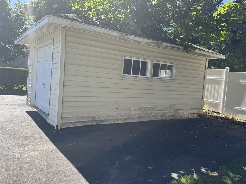 25 Hummock Road Quincy, MA 02171 - Photo 22 of 28 a view of a house with a backyard