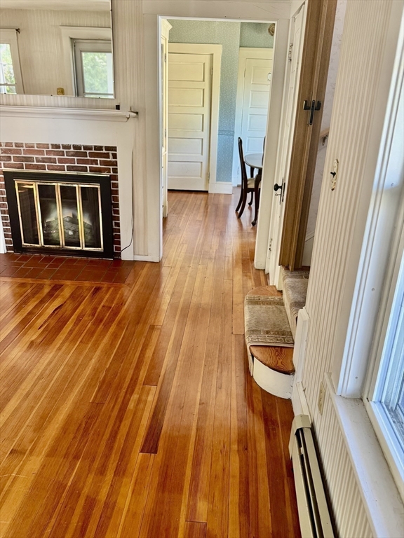 25 Hummock Road Quincy, MA 02171 - Photo 7 of 28 a view of a living room with a fireplace