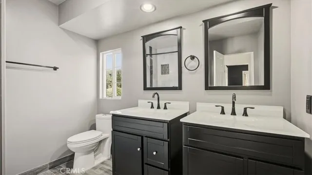 a bathroom with a tub and shower
