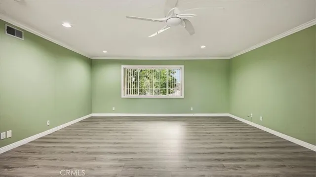 a bathroom with a glass shower door and a glass door