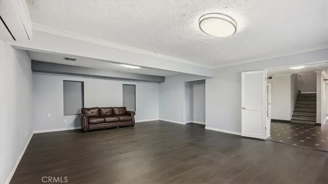 a view of a livingroom with furniture