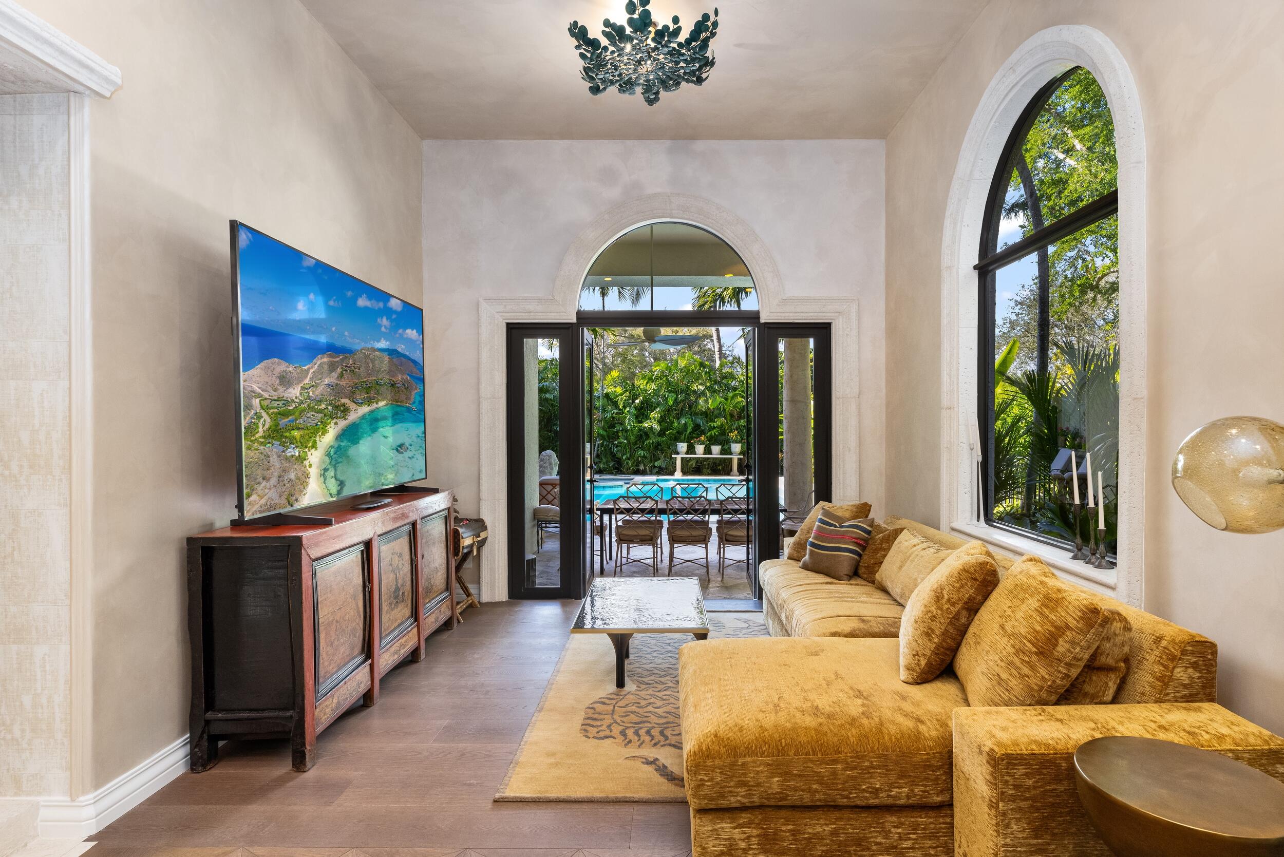 422 Addison Park Lane Boca Raton, FL 33432 - Photo 21 of 70 a living room with furniture fireplace and a large window