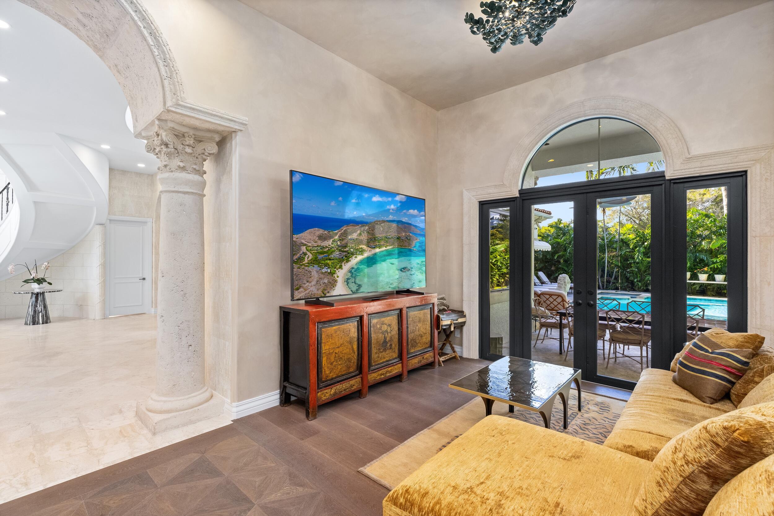 422 Addison Park Lane Boca Raton, FL 33432 - Photo 27 of 70 a living room with furniture and a flat screen tv
