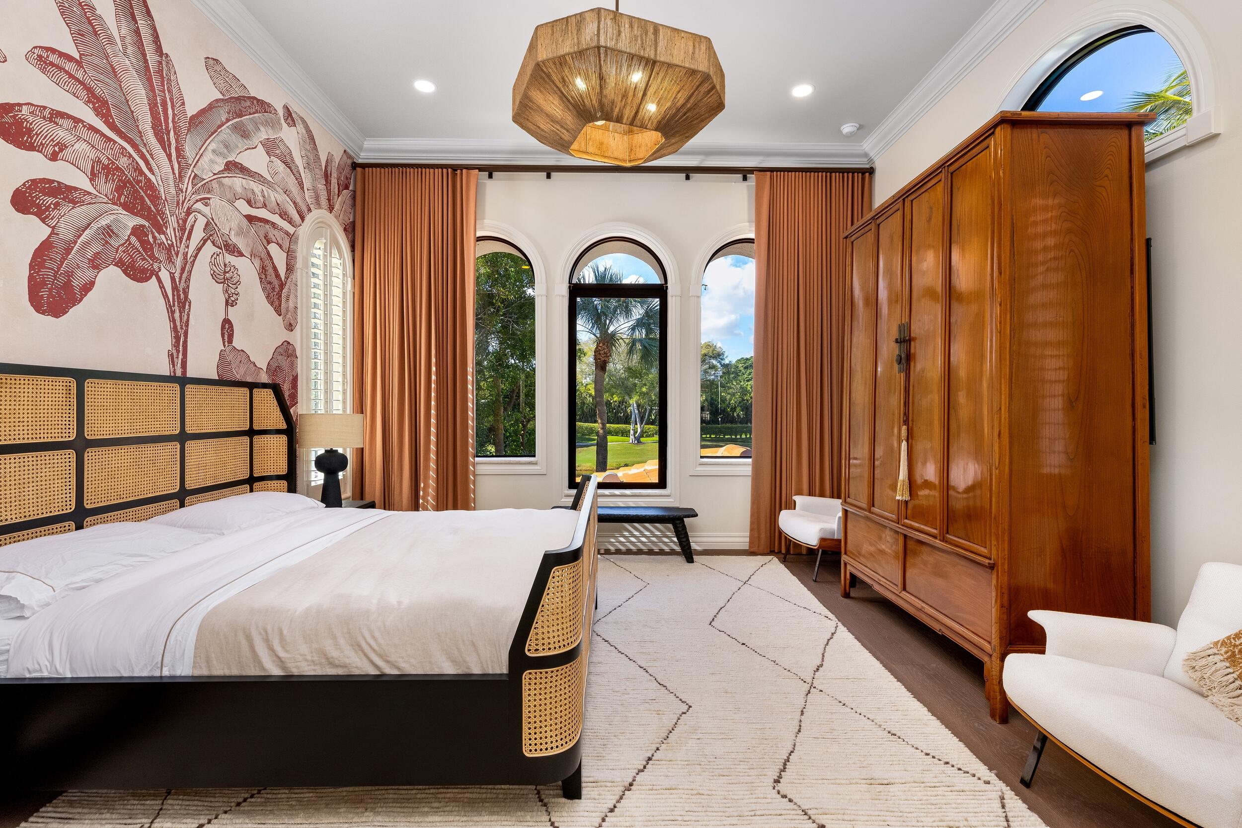 422 Addison Park Lane Boca Raton, FL 33432 - Photo 42 of 70 a bedroom with a bed and painting on the wall