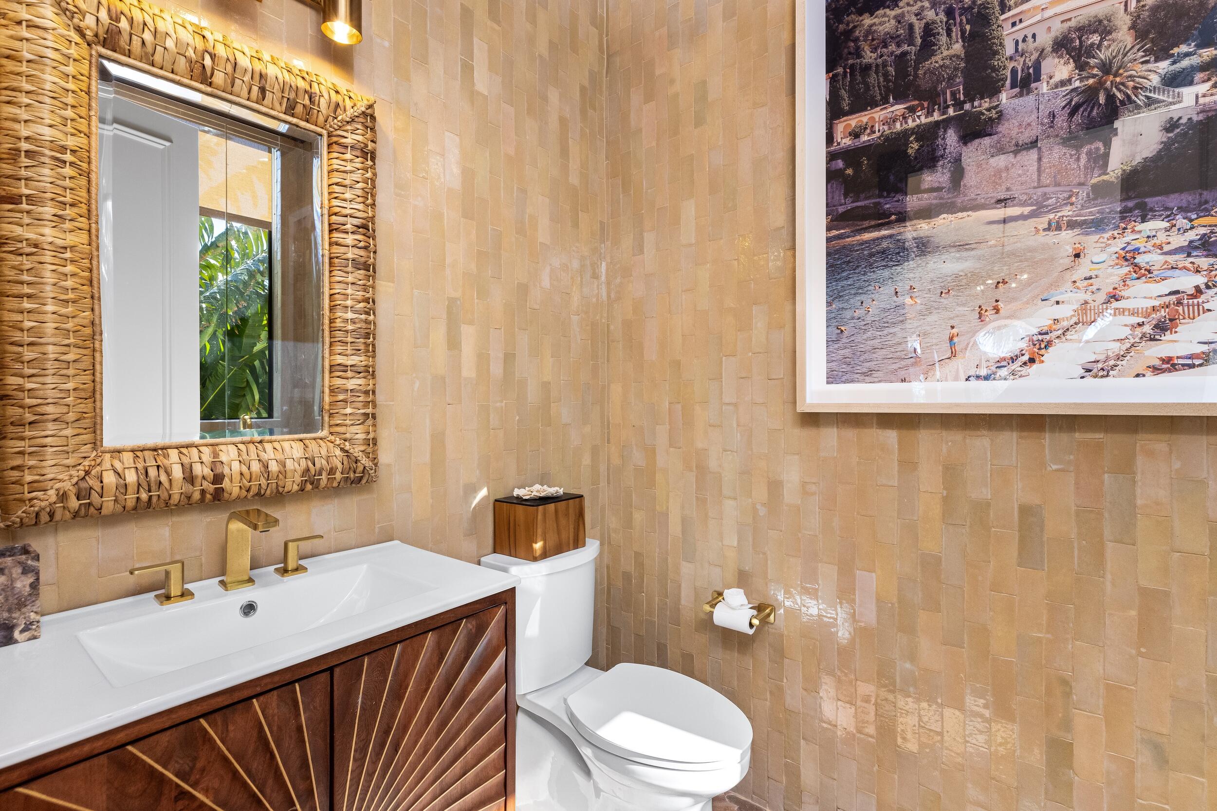 422 Addison Park Lane Boca Raton, FL 33432 - Photo 44 of 70 a bathroom with a sink a toilet and a mirror