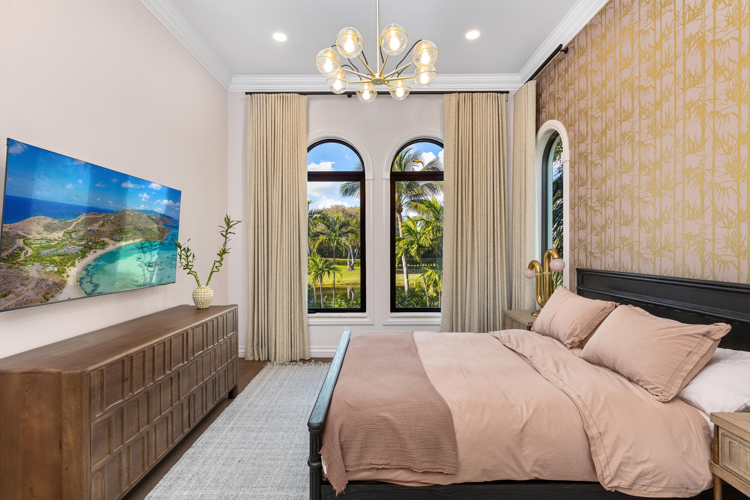 422 Addison Park Lane Boca Raton, FL 33432 - Photo 45 of 70 a bedroom with a large bed and a large window