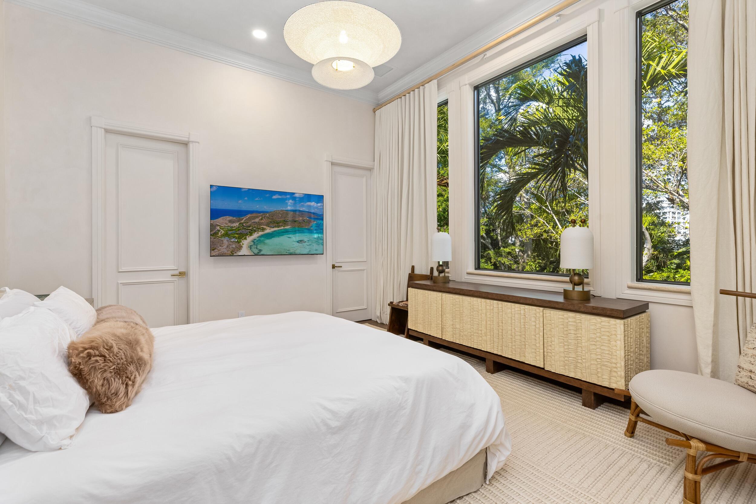 422 Addison Park Lane Boca Raton, FL 33432 - Photo 53 of 70 a bedroom with a bed and a large window