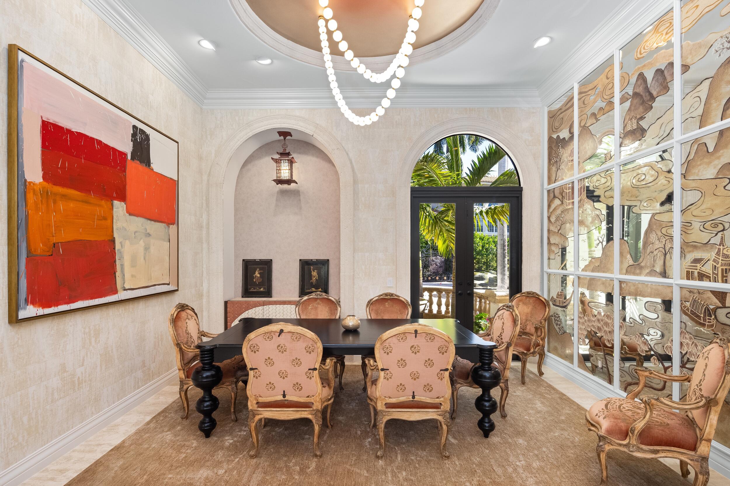 422 Addison Park Lane Boca Raton, FL 33432 - Photo 9 of 70 a large living room with furniture a chandelier and a large window