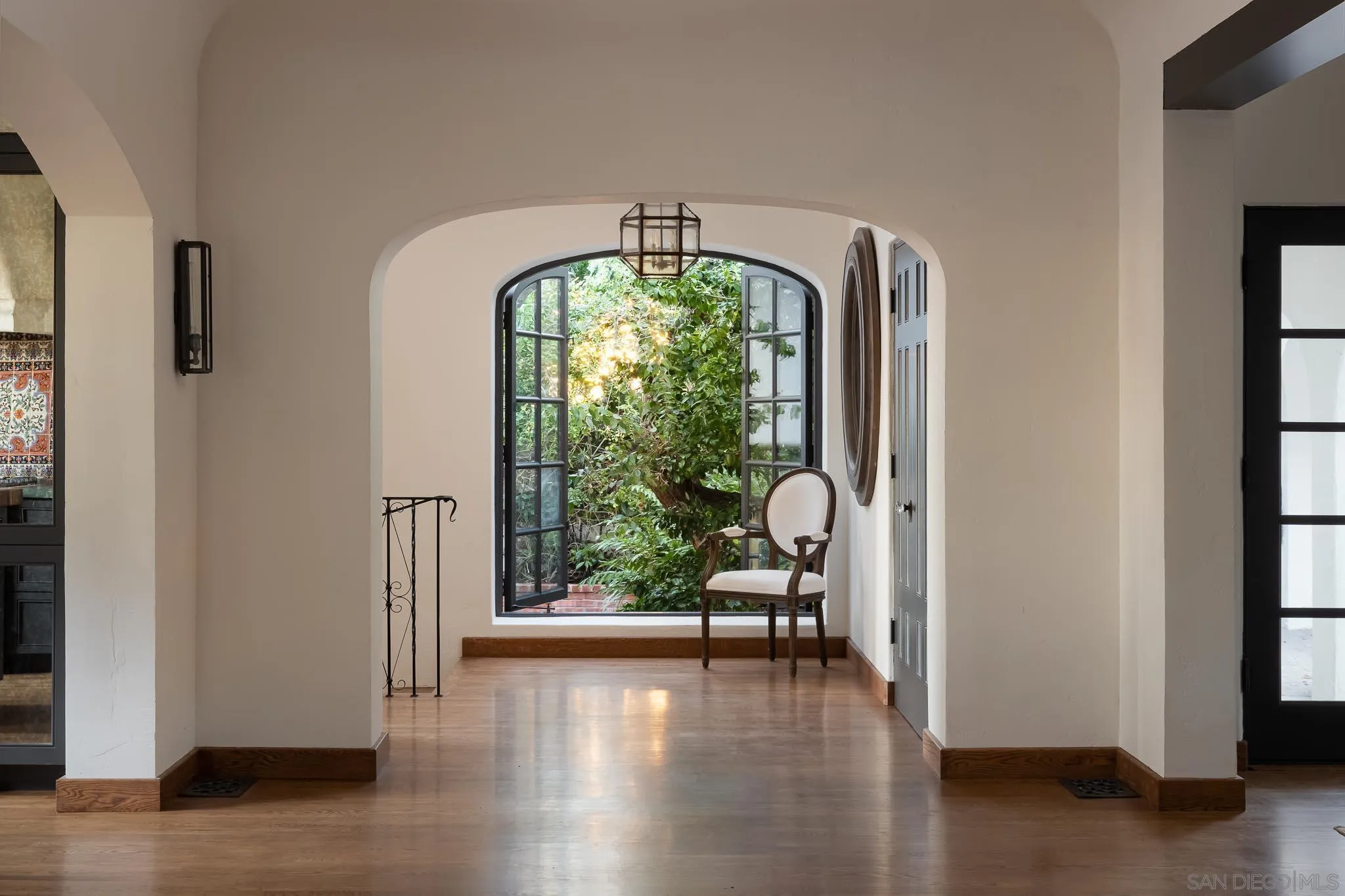 1004 Devonshire Drive San Diego, CA 92107 - Photo 14 of 54 a living room with furniture and a large window or wooden floor