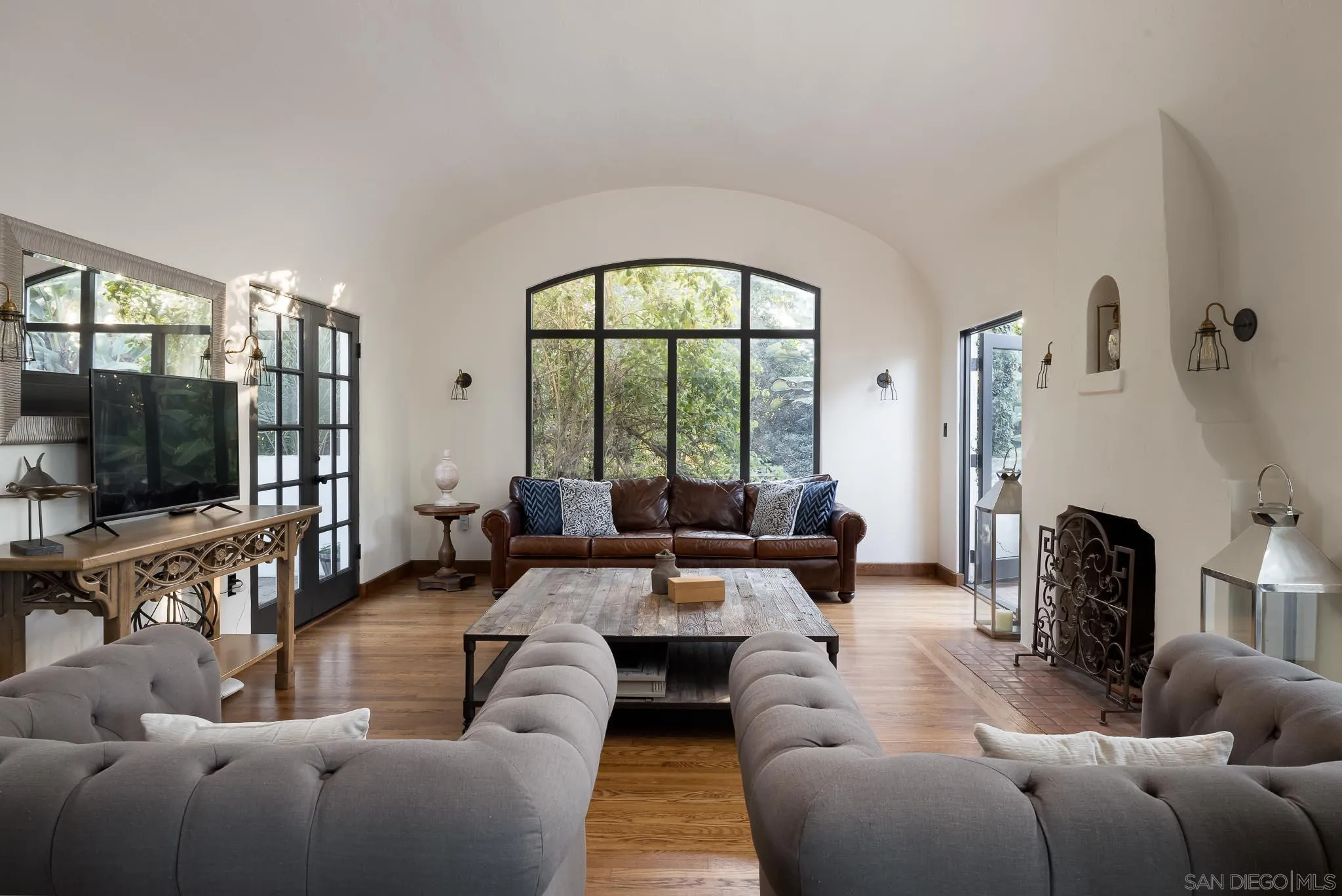 1004 Devonshire Drive San Diego, CA 92107 - Photo 15 of 54 a living room with furniture large window and a flat screen tv