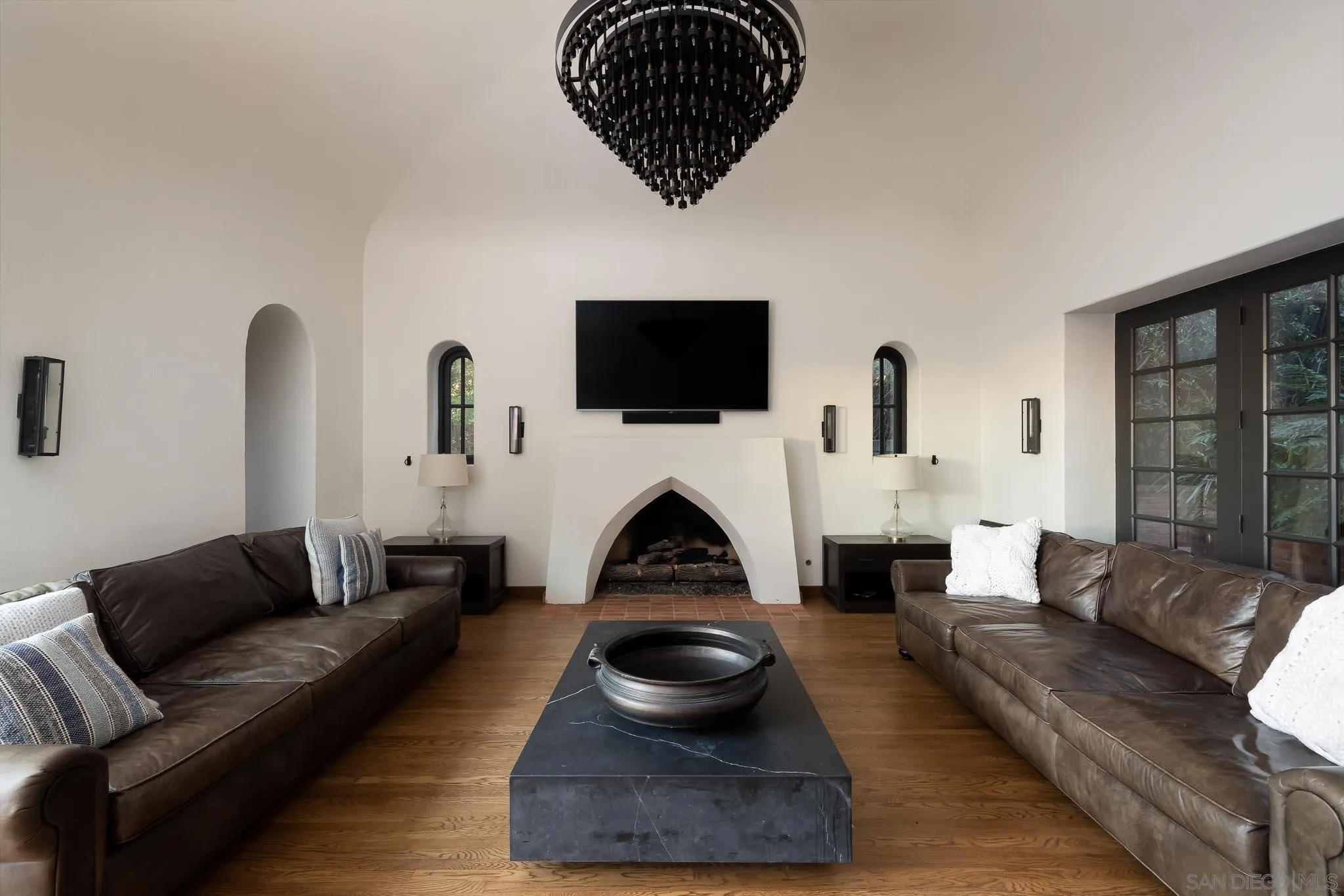 1004 Devonshire Drive San Diego, CA 92107 - Photo 19 of 54 a living room with furniture a fireplace and a flat screen tv