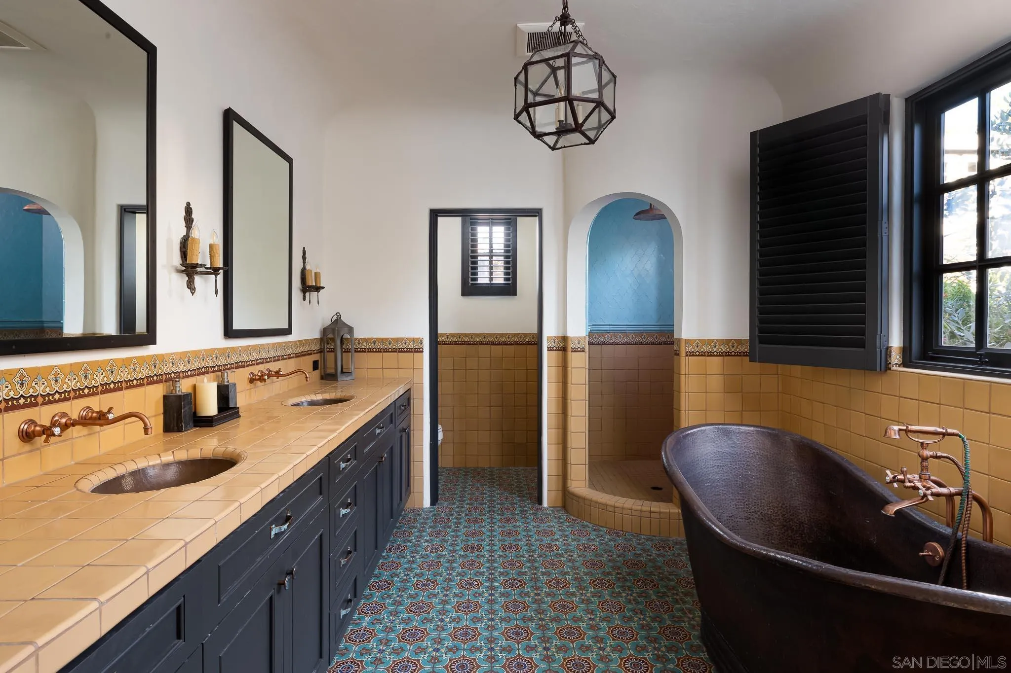 1004 Devonshire Drive San Diego, CA 92107 - Photo 28 of 54 a bathroom with a sink and a mirror