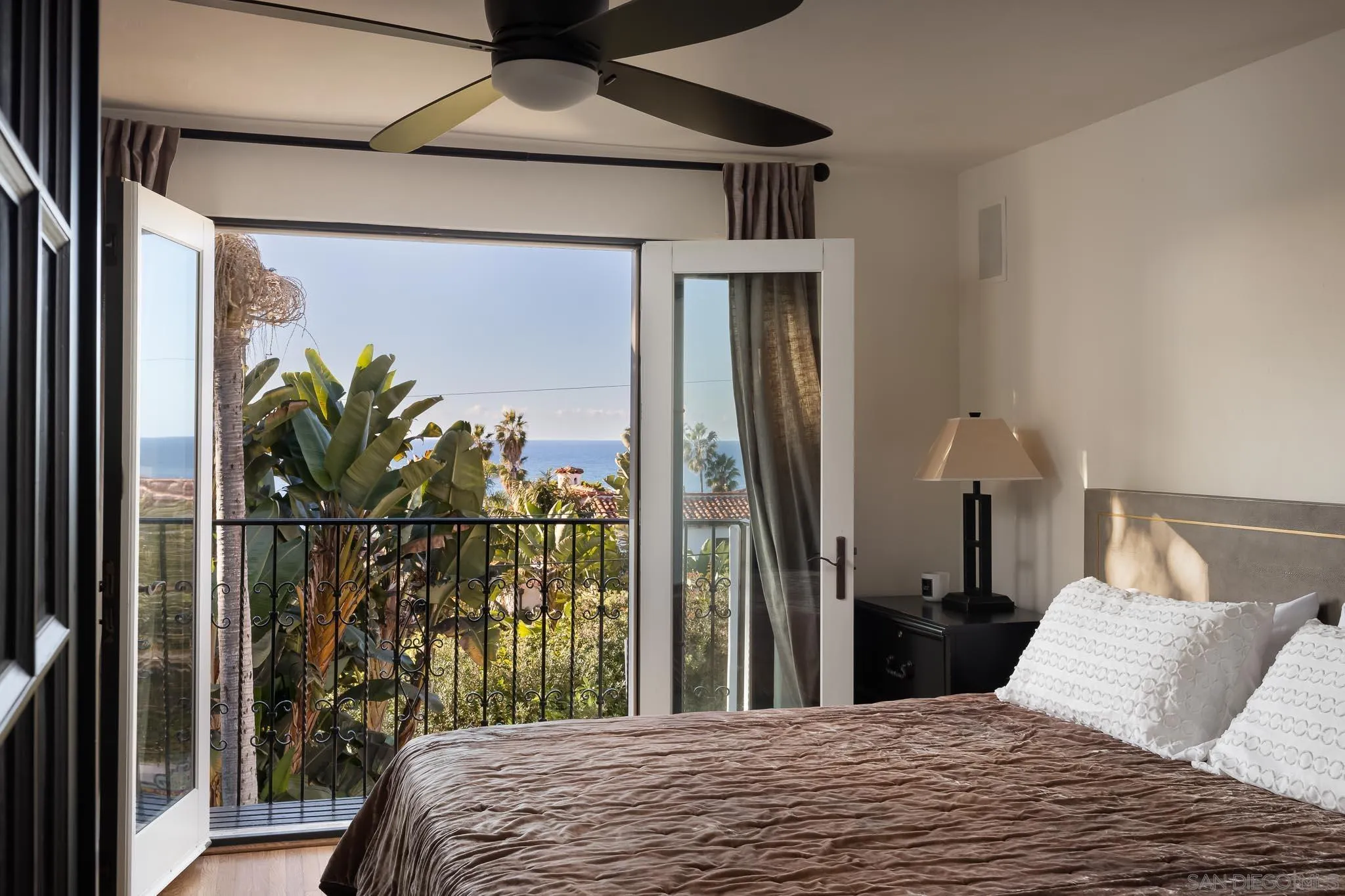 1004 Devonshire Drive San Diego, CA 92107 - Photo 30 of 54 a bedroom with a bed and a window