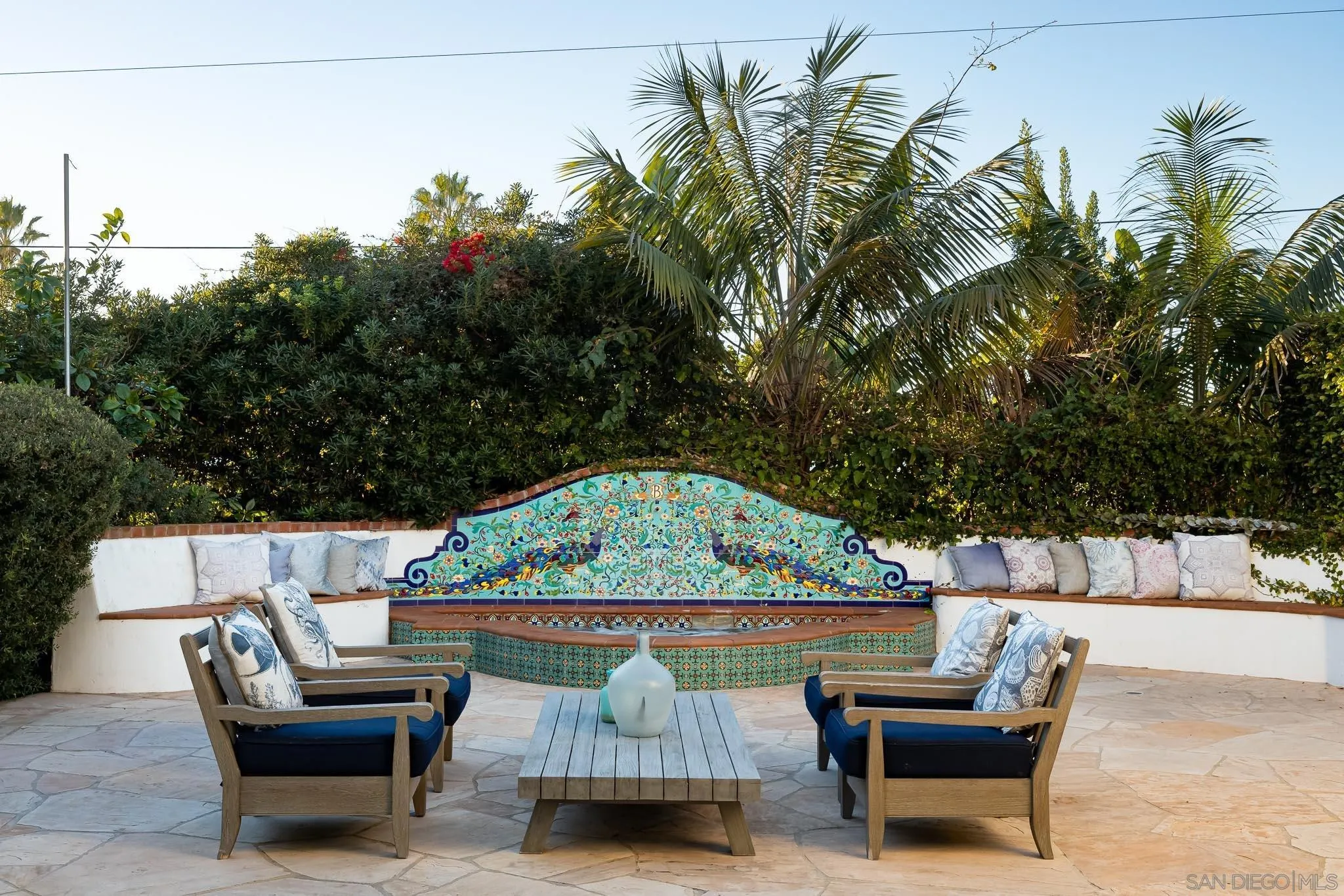 1004 Devonshire Drive San Diego, CA 92107 - Photo 39 of 54 an outdoor sitting area with a couch and a garden