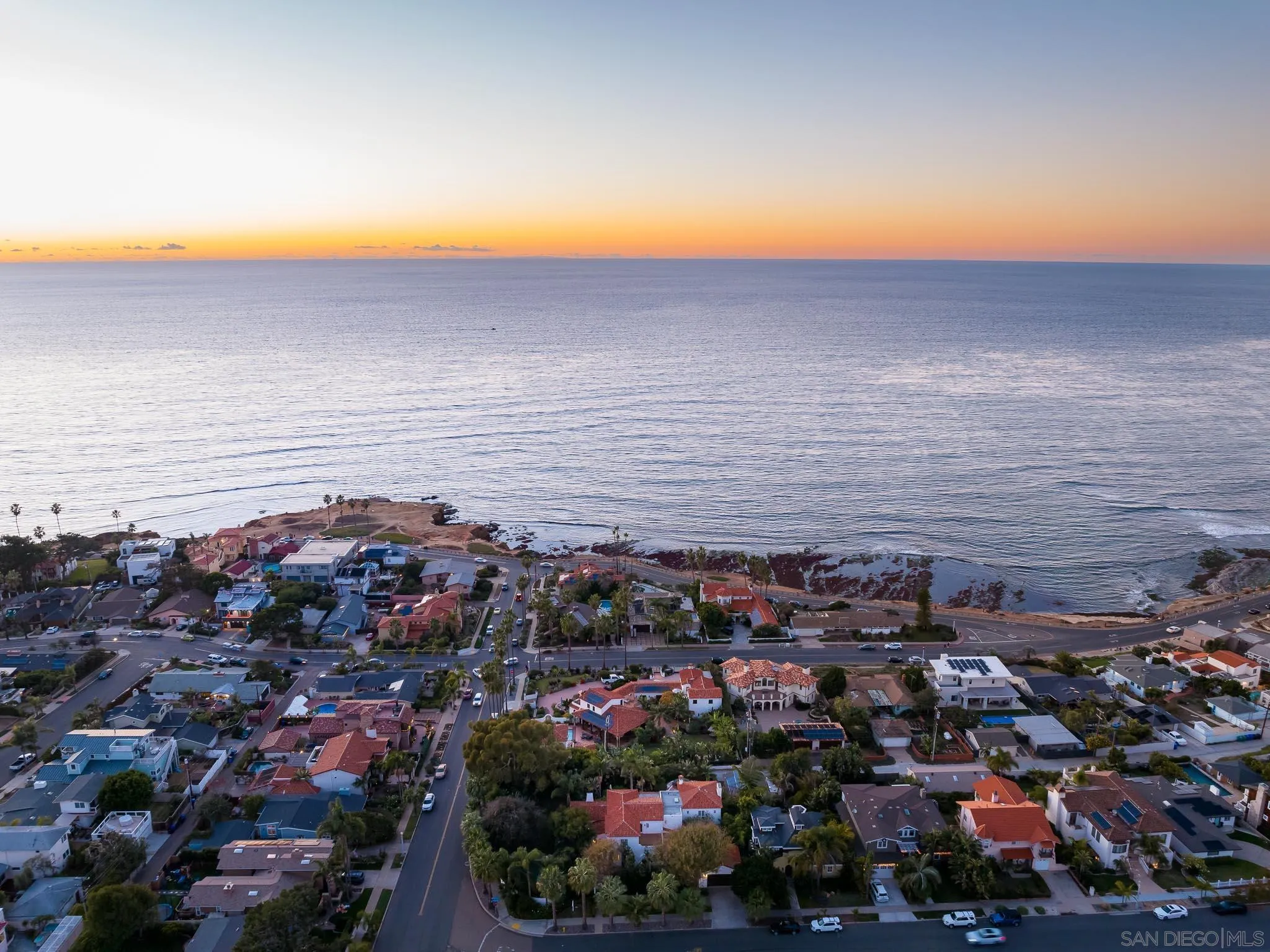 1004 Devonshire Drive San Diego, CA 92107 - Photo 5 of 54 an aerial view of ocean and residential houses with outdoor space