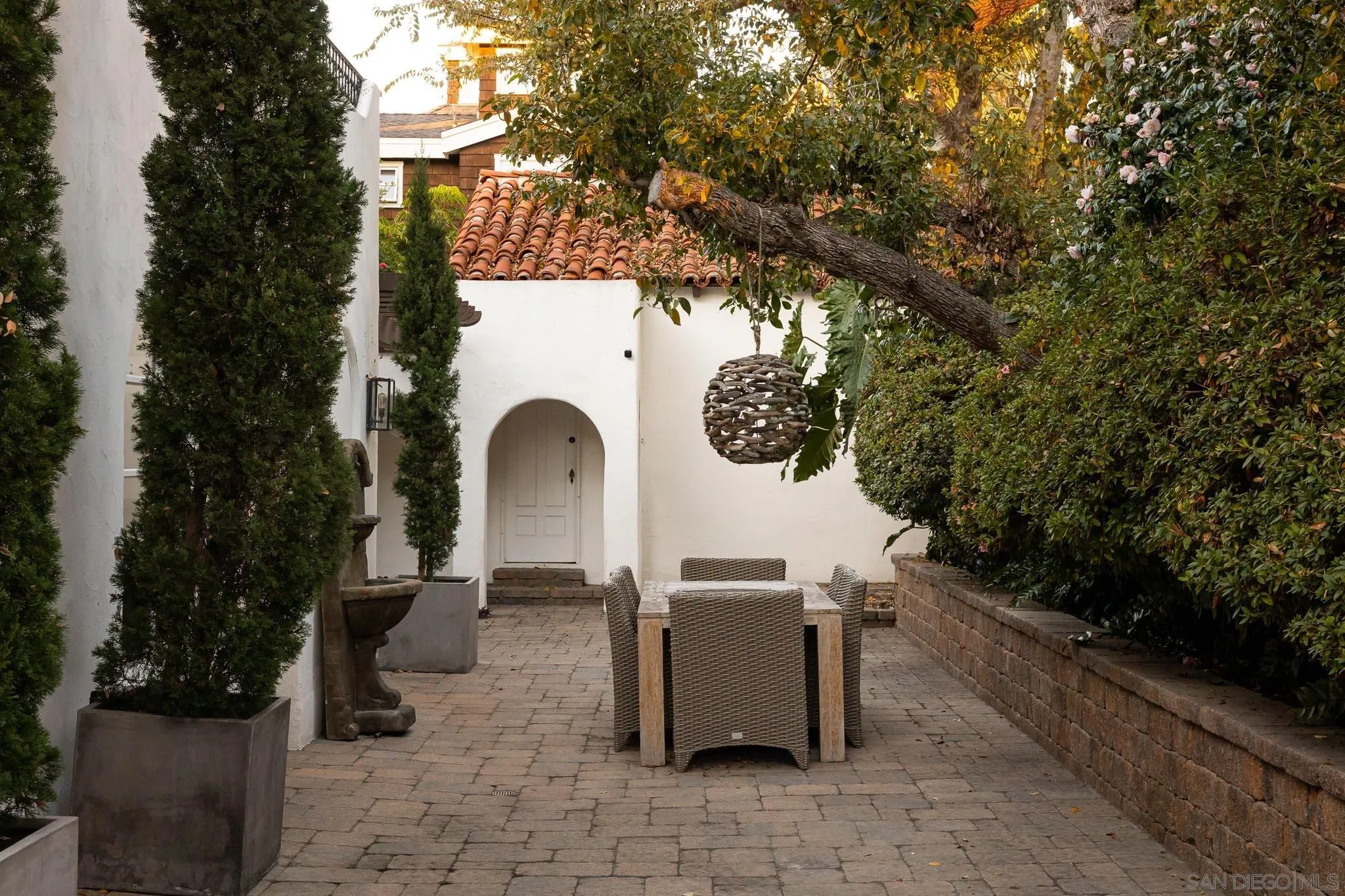 1004 Devonshire Drive San Diego, CA 92107 - Photo 51 of 54 a view of a patio with couches and table and chairs and potted plants