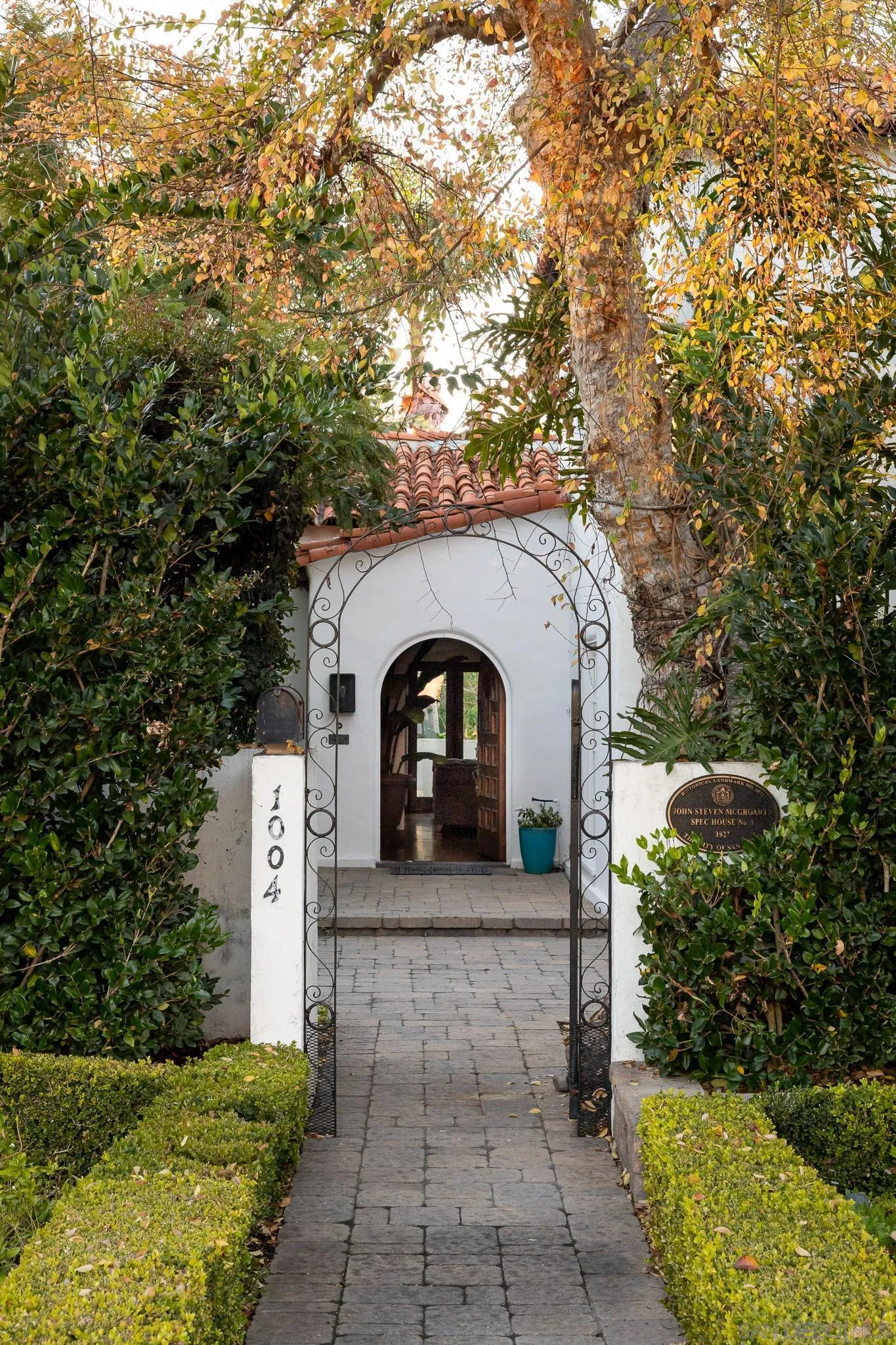 1004 Devonshire Drive San Diego, CA 92107 - Photo 7 of 54 a front view of a house with a yard