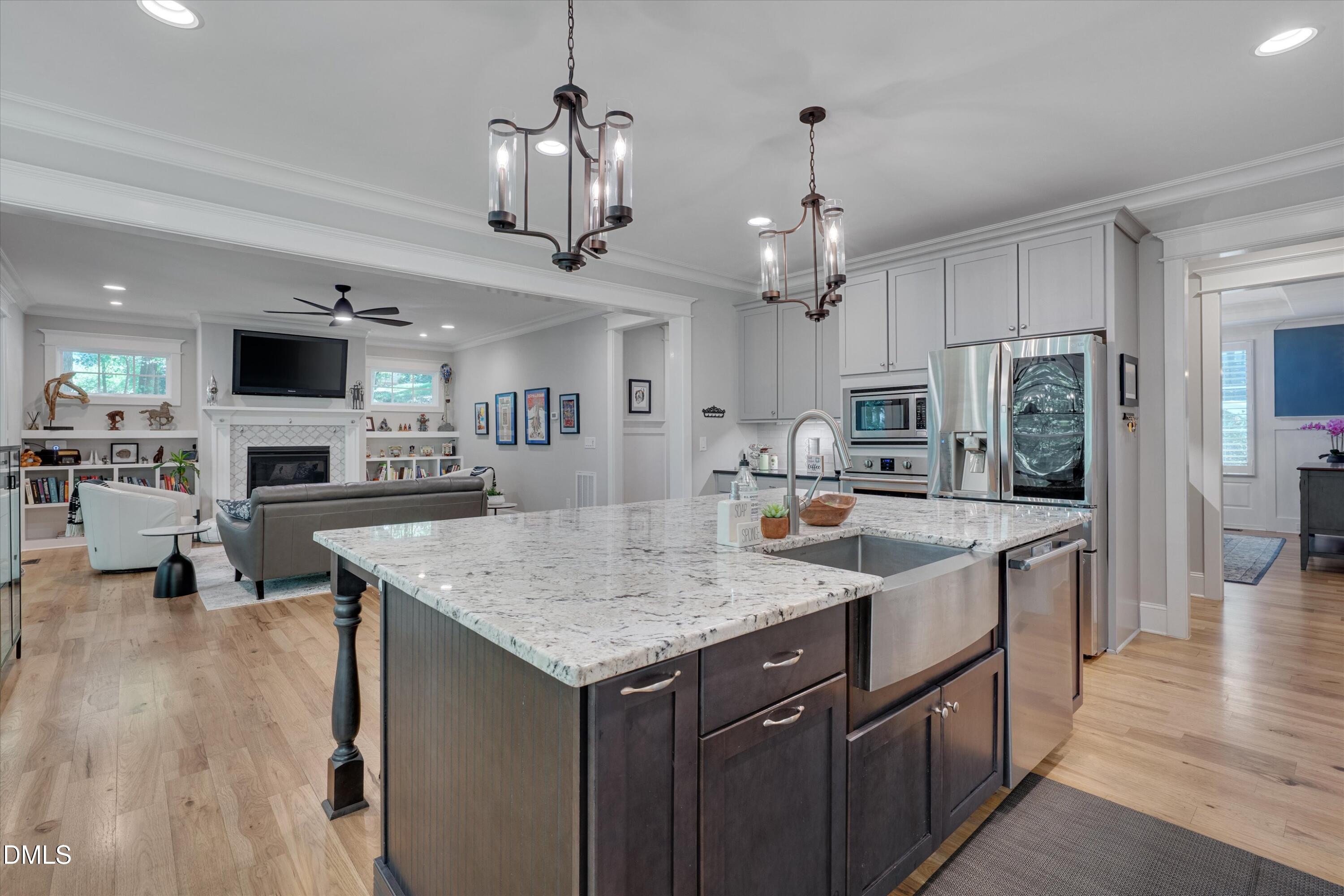 8601 Oneal Road Raleigh, NC 27613 - Photo 21 of 87 a kitchen with stainless steel appliances granite countertop a sink refrigerator and cabinets