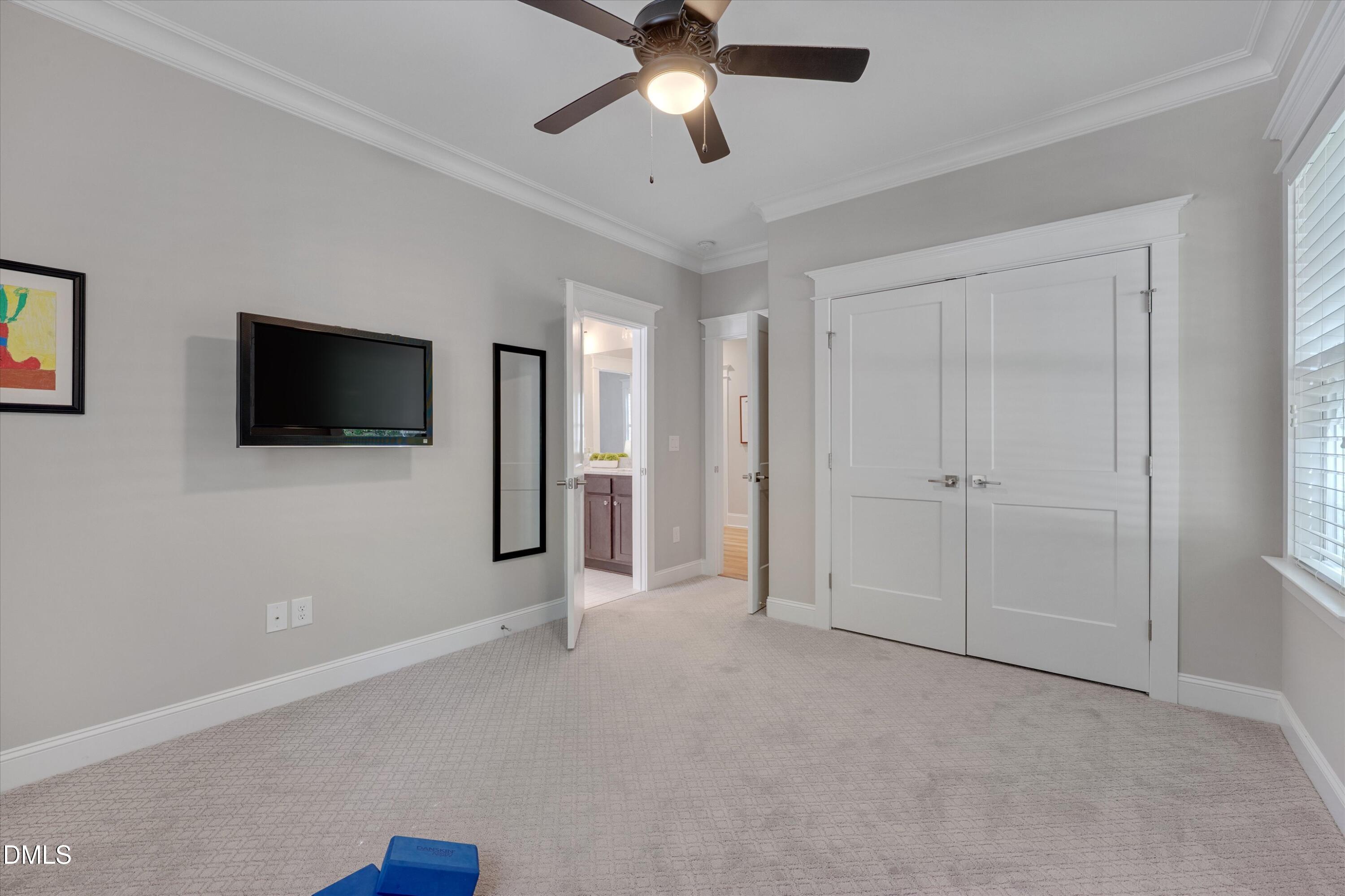 8601 Oneal Road Raleigh, NC 27613 - Photo 49 of 87 a view of a livingroom with a flat screen tv