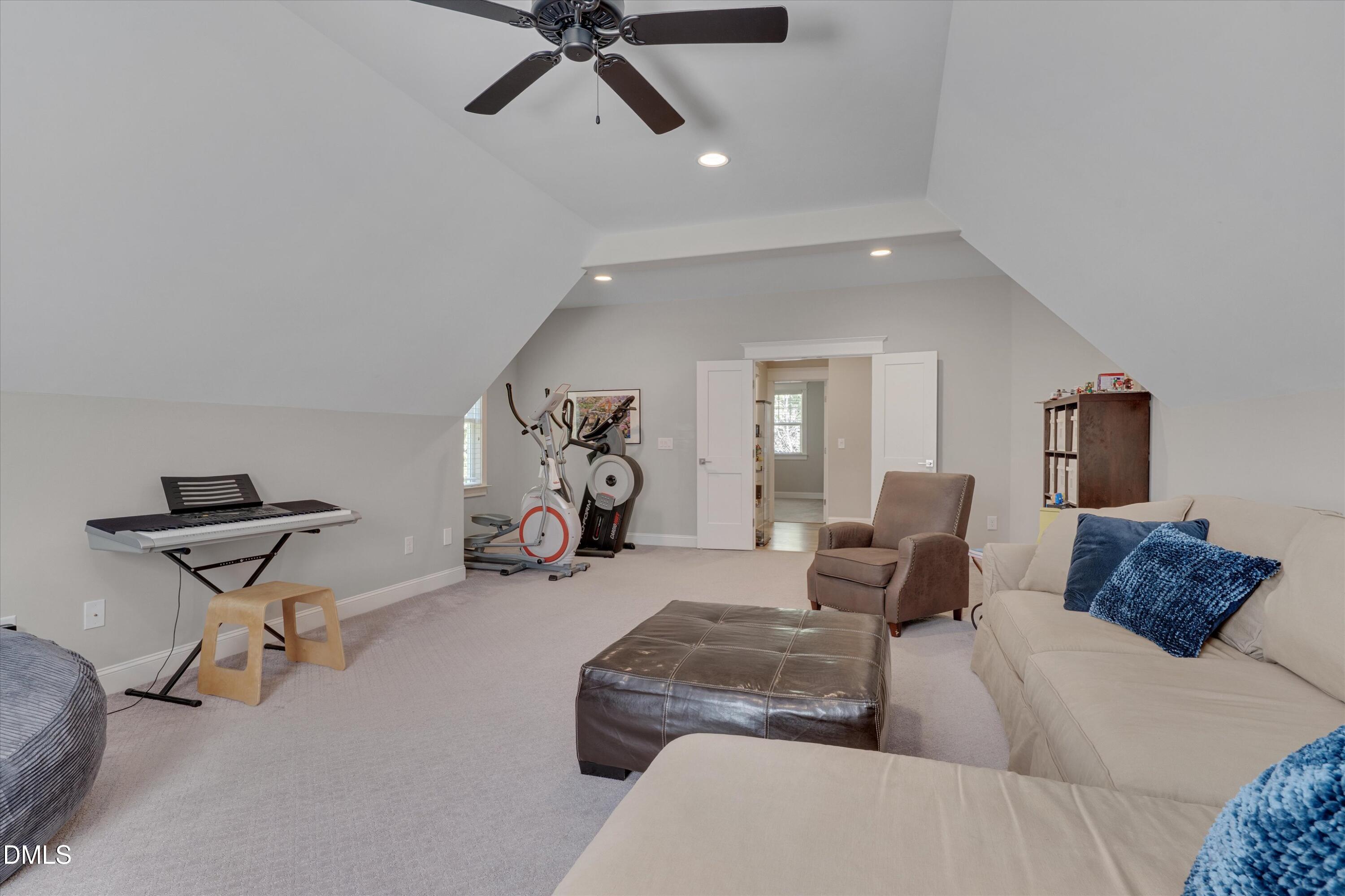 8601 Oneal Road Raleigh, NC 27613 - Photo 54 of 87 a living room with furniture and a rug