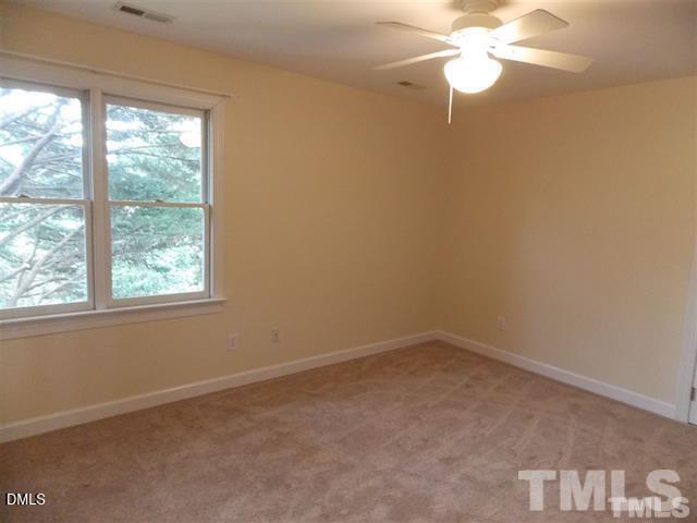205 Berry Hill Drive Raleigh, NC 27615 - Photo 16 of 53 an empty room with a window