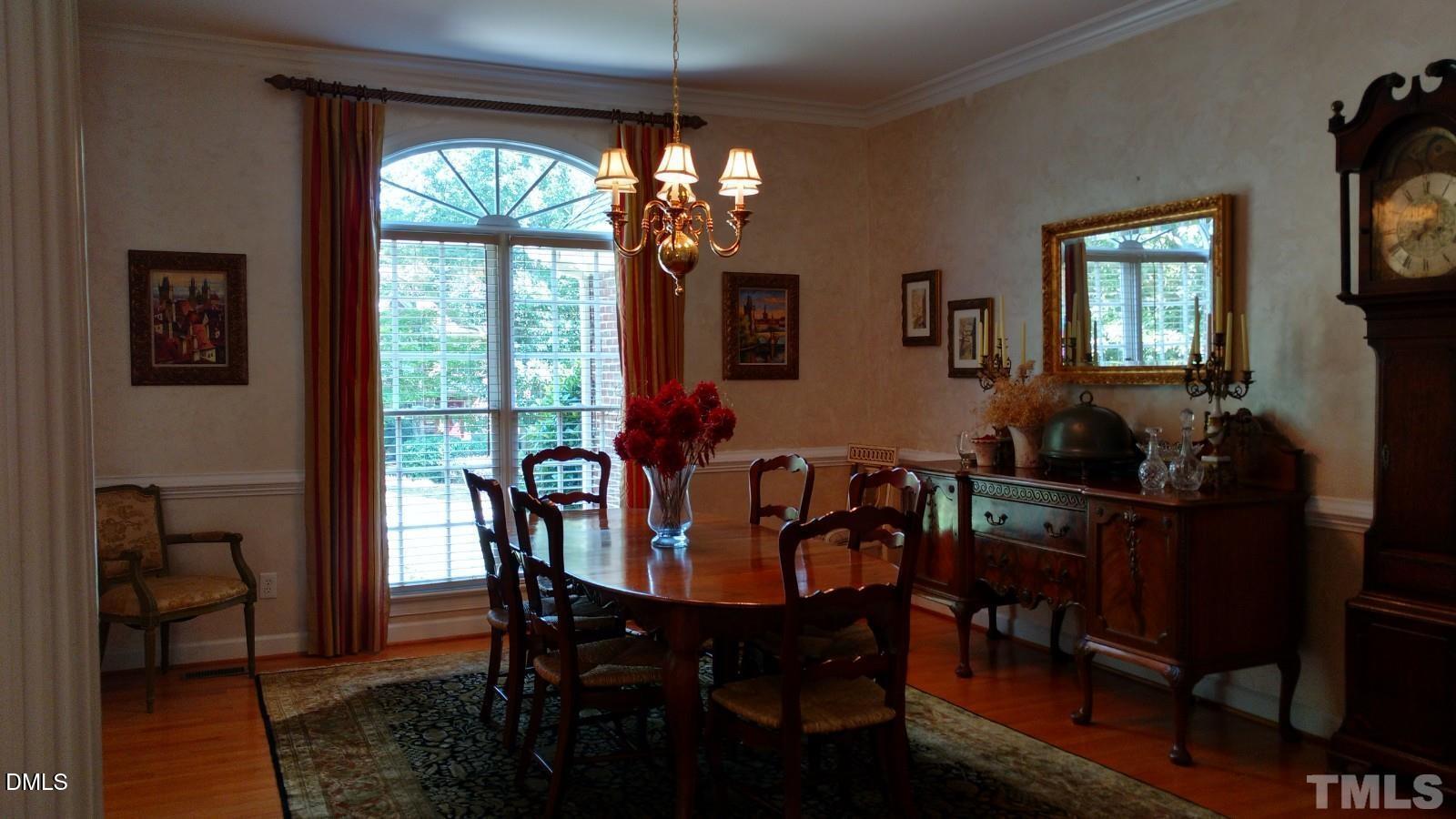205 Berry Hill Drive Raleigh, NC 27615 - Photo 30 of 53 a view of a dining room with furniture window and outside view