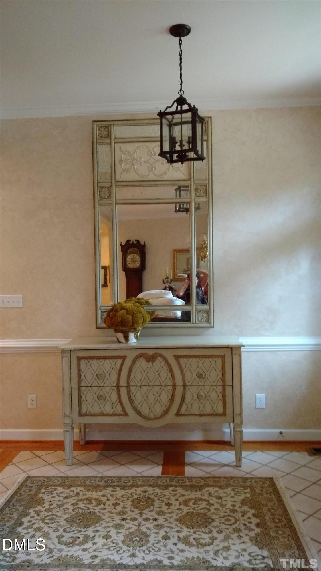 205 Berry Hill Drive Raleigh, NC 27615 - Photo 36 of 53 a bathroom with a sink and a mirror