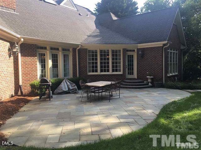 205 Berry Hill Drive Raleigh, NC 27615 - Photo 43 of 53 a view of a house with backyard and sitting area