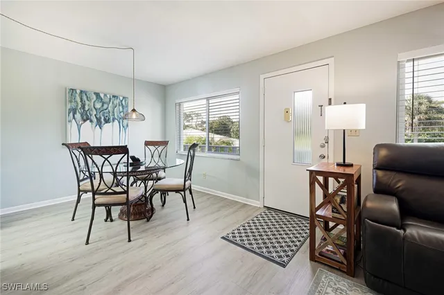 a view of a livingroom with furniture and window
