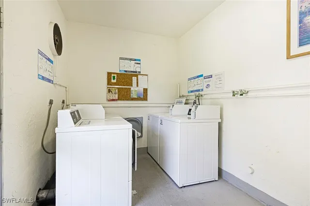 a room with a couch and a table with wooden floor