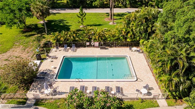 a view of a yard with furniture