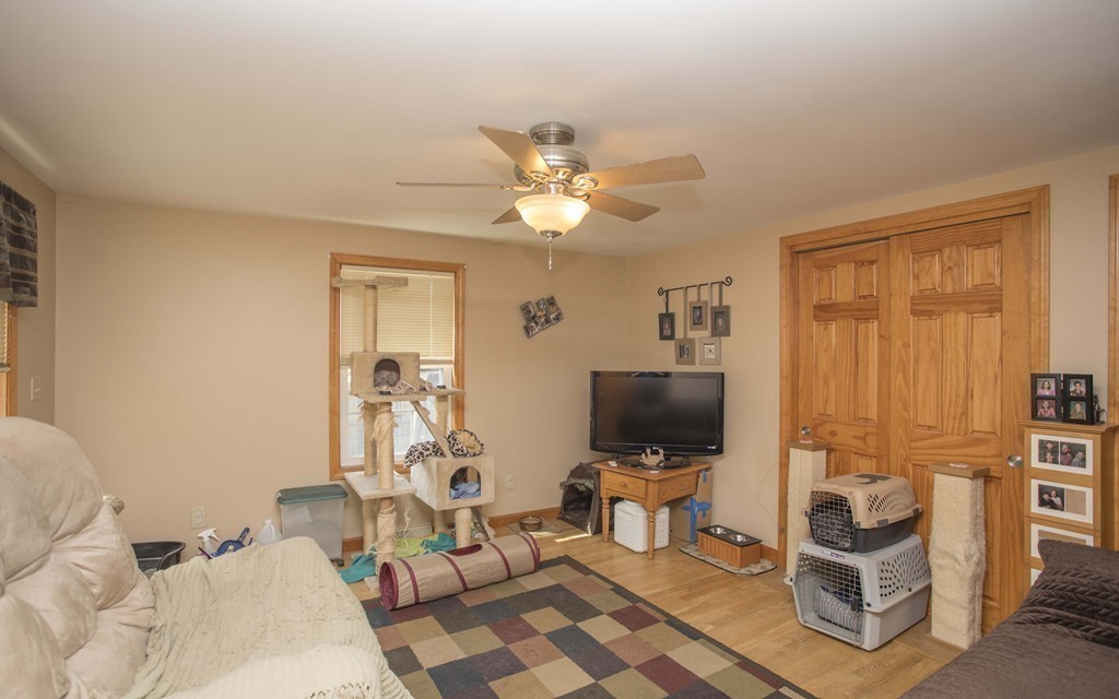 201 Riley Avenue Somerset, MA 02726 - Photo 14 of 22 a living room with furniture a flat screen tv and a window