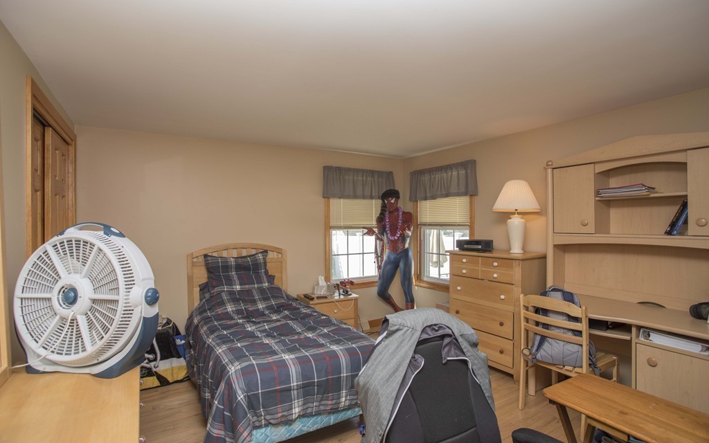 201 Riley Avenue Somerset, MA 02726 - Photo 17 of 22 a spacious bedroom with two beds and a dresser