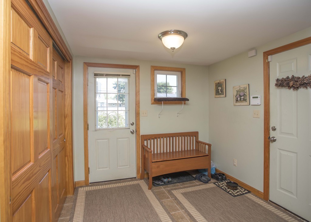 201 Riley Avenue Somerset, MA 02726 - Photo 6 of 22 a view of livingroom with furniture and windows