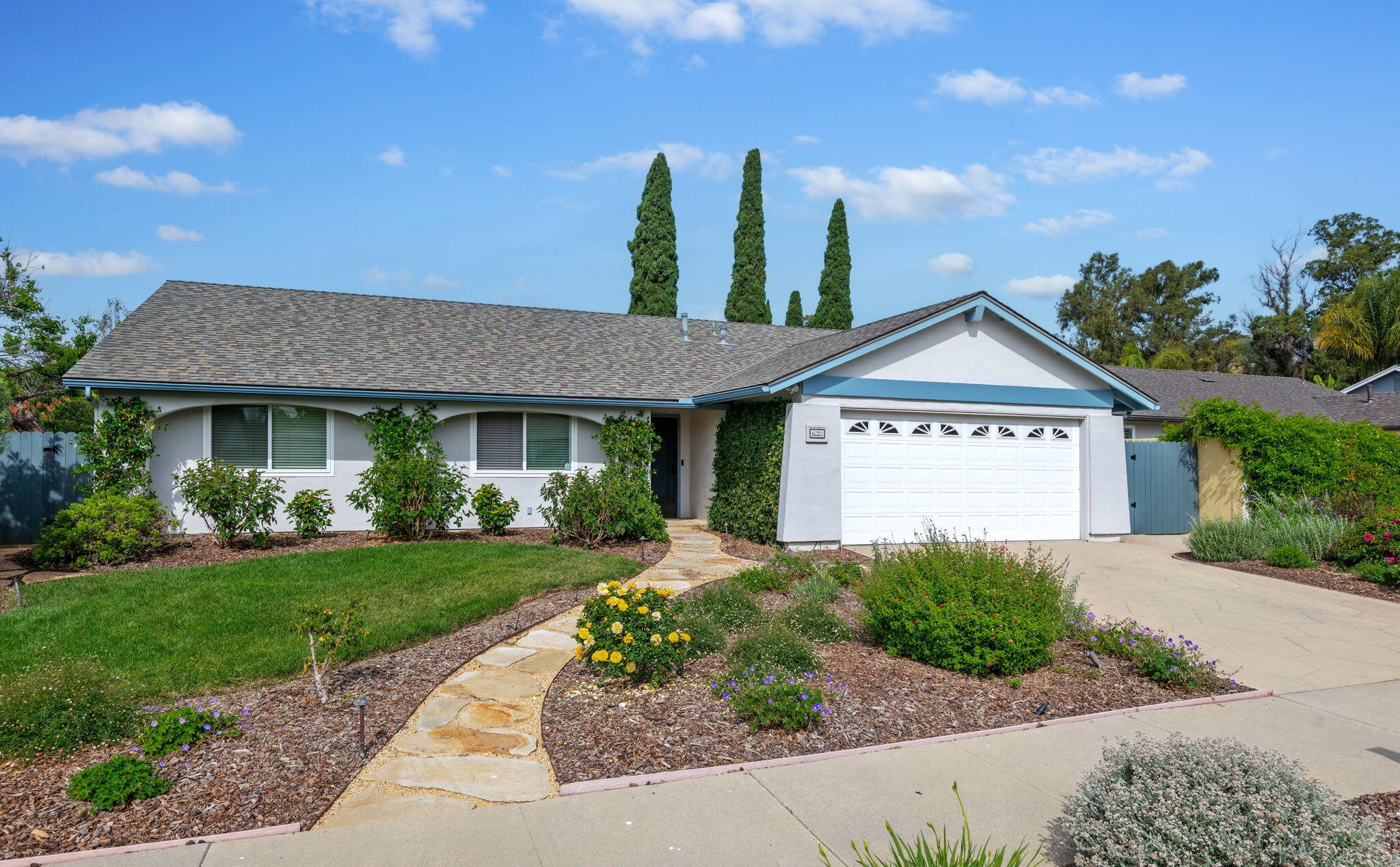 6020 Paseo Palmilla Goleta, CA 93117 - Photo 1 of 33 a view of a house with a yard and potted plants