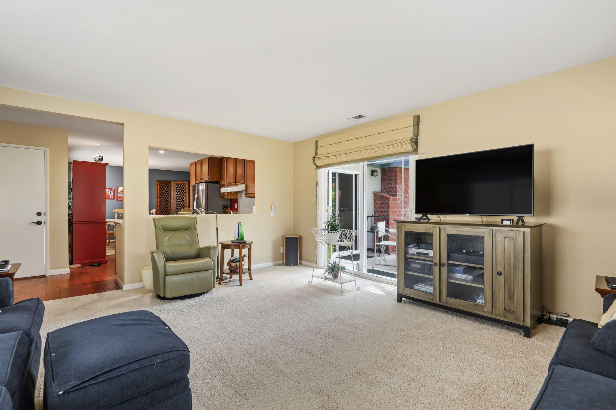 6020 Paseo Palmilla Goleta, CA 93117 - Photo 14 of 33 a living room with furniture and a flat screen tv