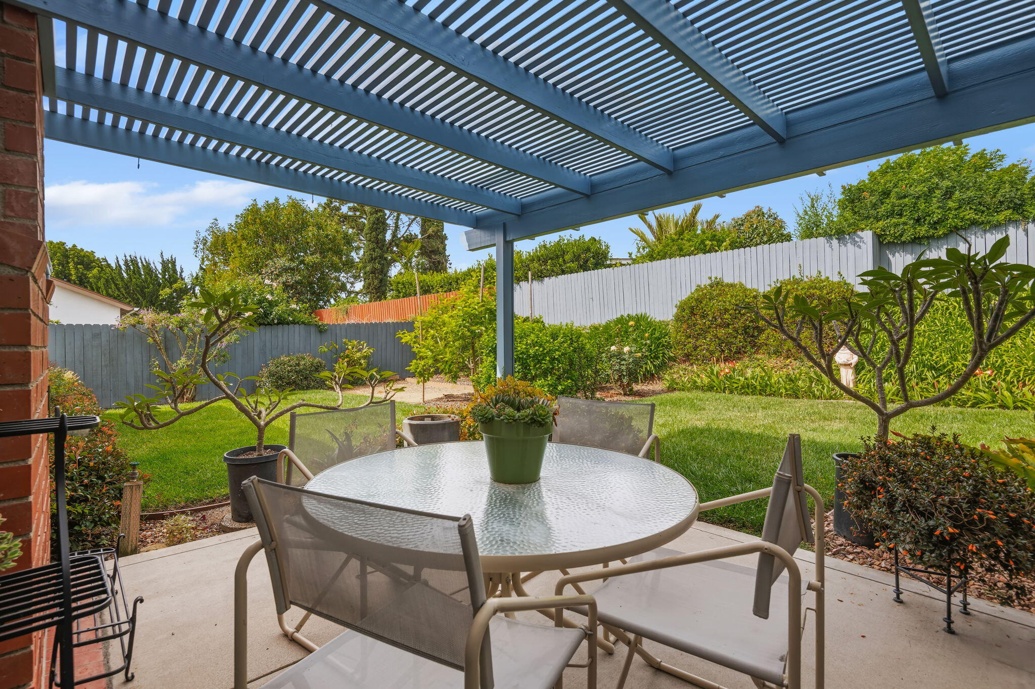 6020 Paseo Palmilla Goleta, CA 93117 - Photo 15 of 33 a view of an outdoor dining space with a table and chairs
