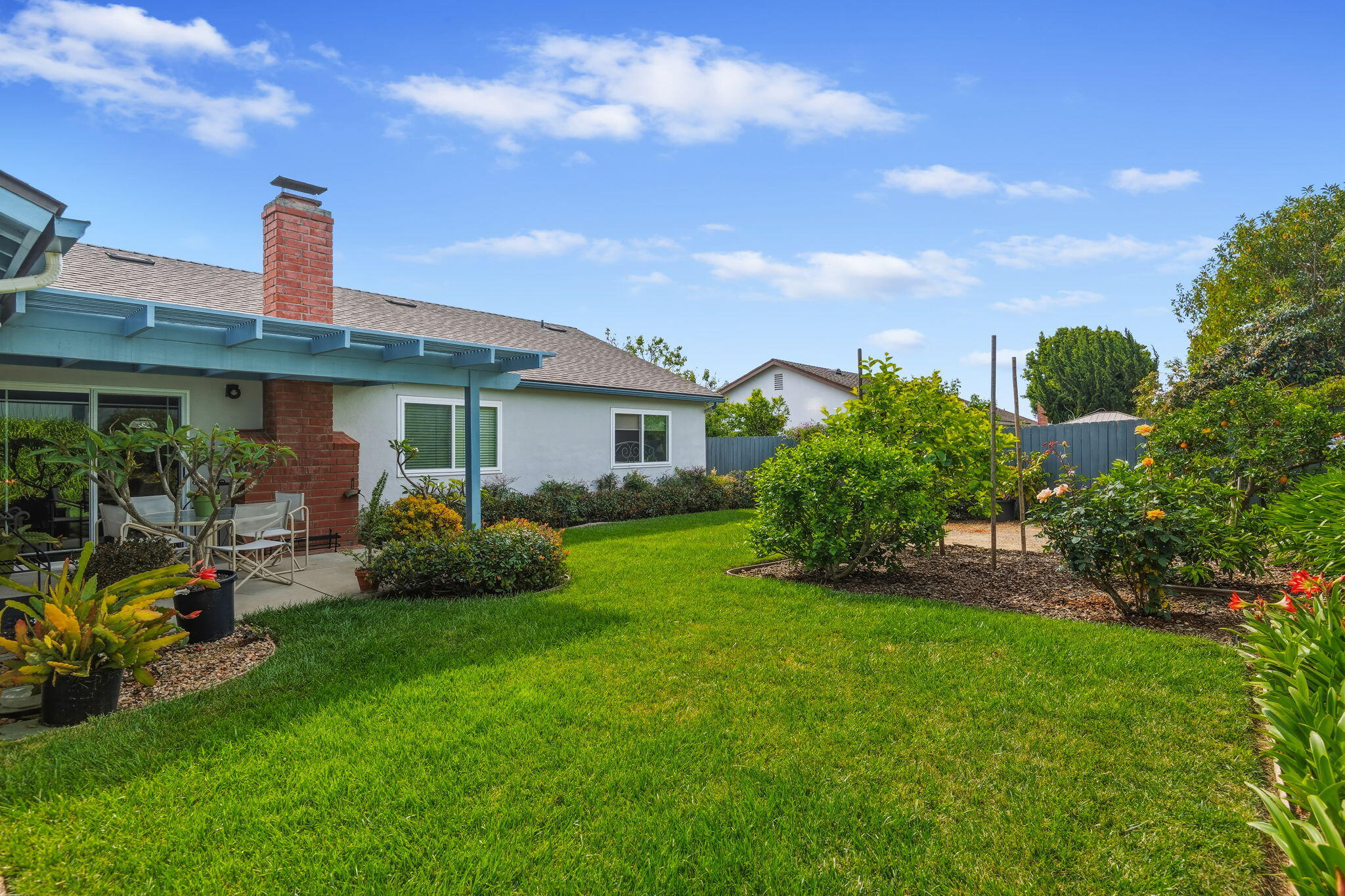 6020 Paseo Palmilla Goleta, CA 93117 - Photo 17 of 33 a front view of house with yard and green space