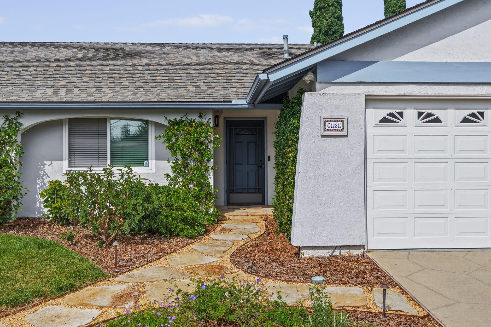 6020 Paseo Palmilla Goleta, CA 93117 - Photo 2 of 33 a front view of a house with garden