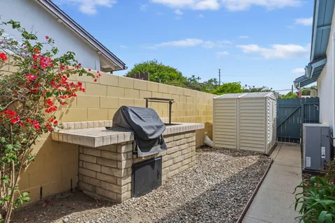a view of a terrace with sitting area
