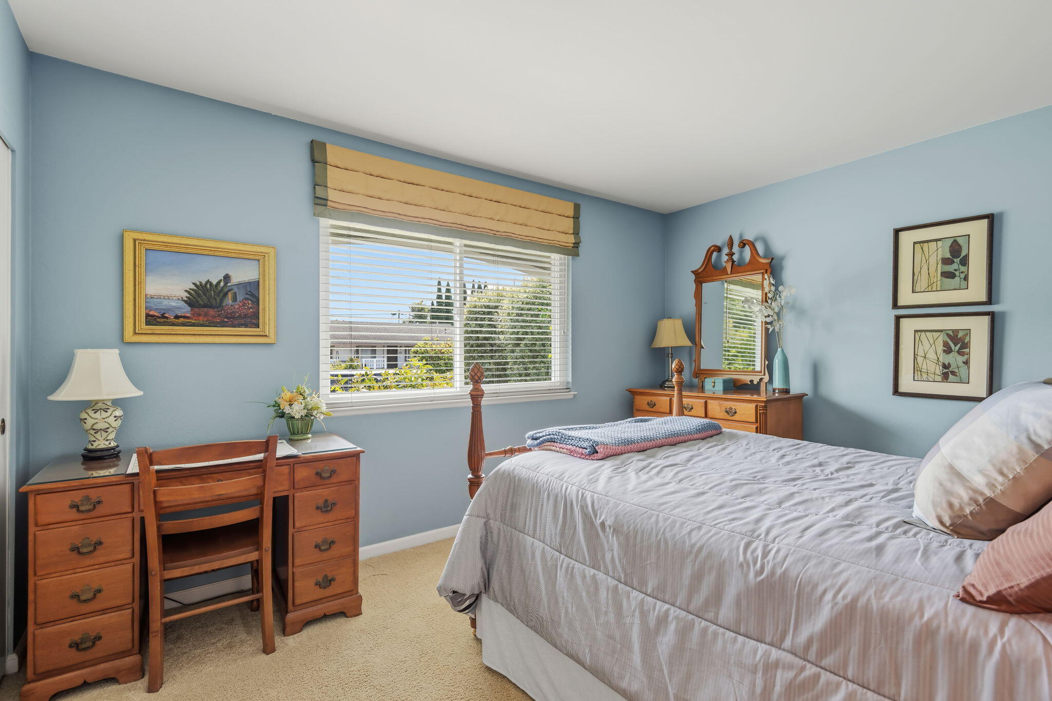 6020 Paseo Palmilla Goleta, CA 93117 - Photo 25 of 33 a bedroom with a bed and a table in it