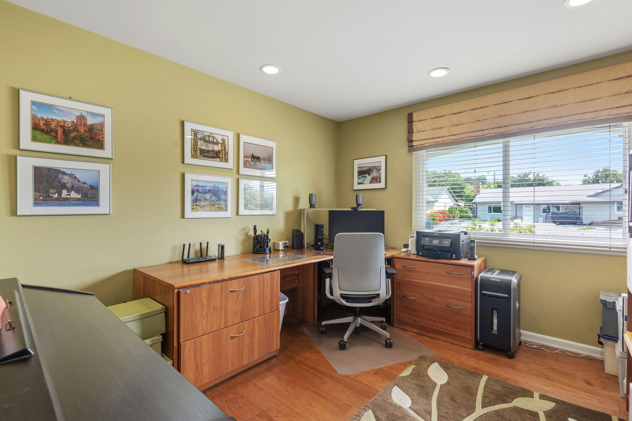 6020 Paseo Palmilla Goleta, CA 93117 - Photo 27 of 33 a room with a table chairs and a workspace