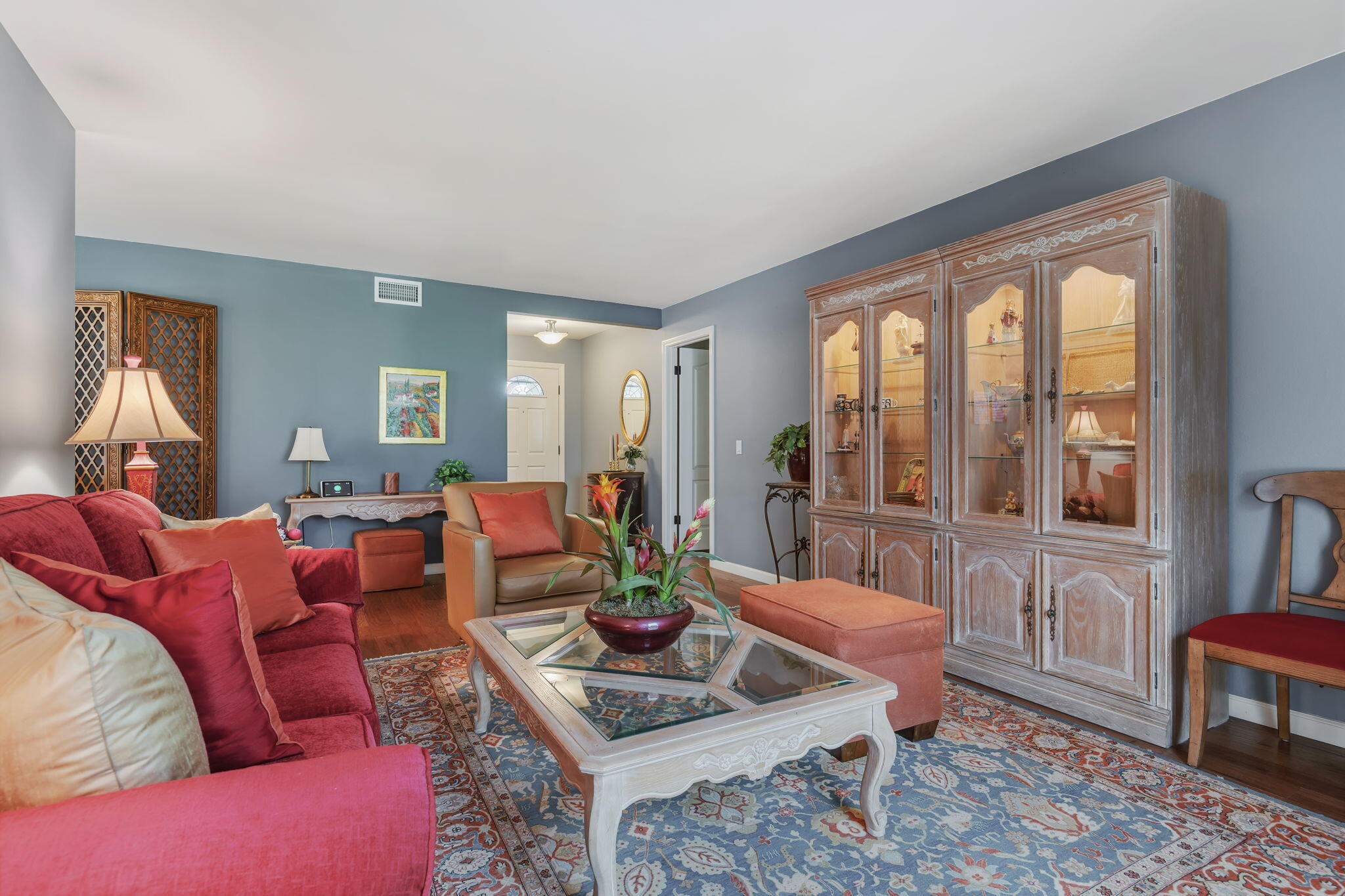 6020 Paseo Palmilla Goleta, CA 93117 - Photo 6 of 33 a living room with furniture and a potted plant
